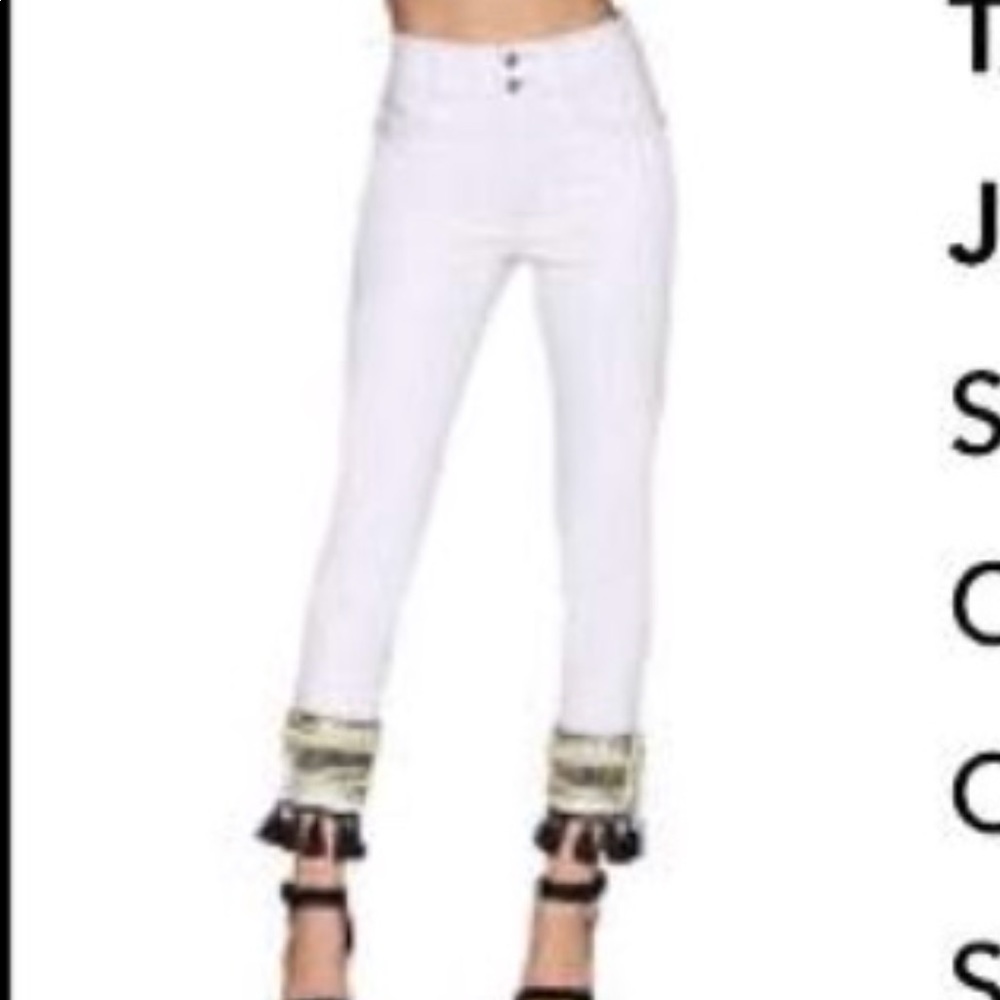 White Jeans With Black And Gold Embellishments